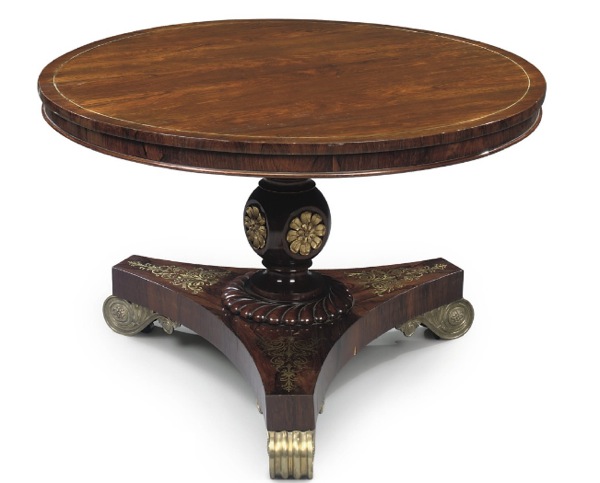 A GEORGE IV BRASS-INLAID AND MOUNTED ROSEWOOD CIRCULAR CENTRE TABLE .png